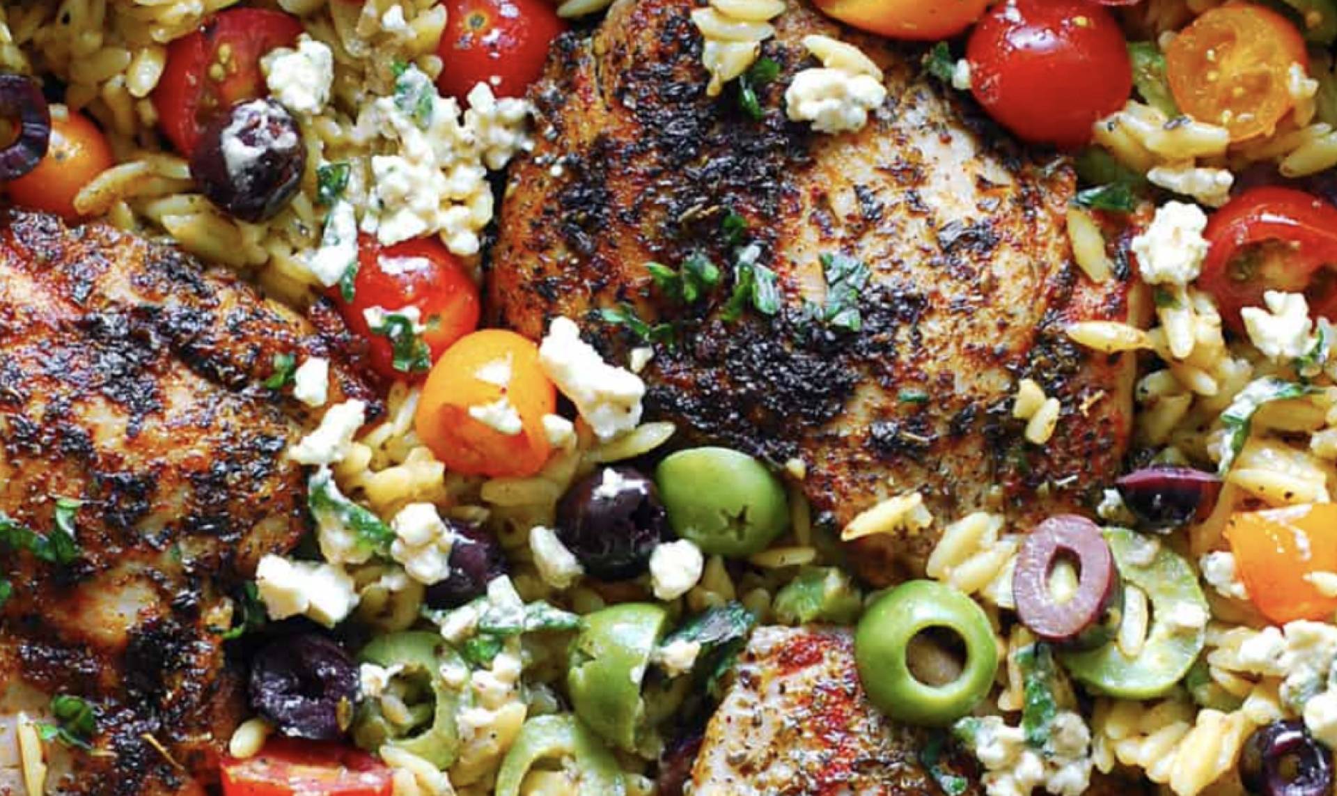 Greek Chicken Breast over Orzo Pasta with Feta, Olives, Tomato, and Peppers
