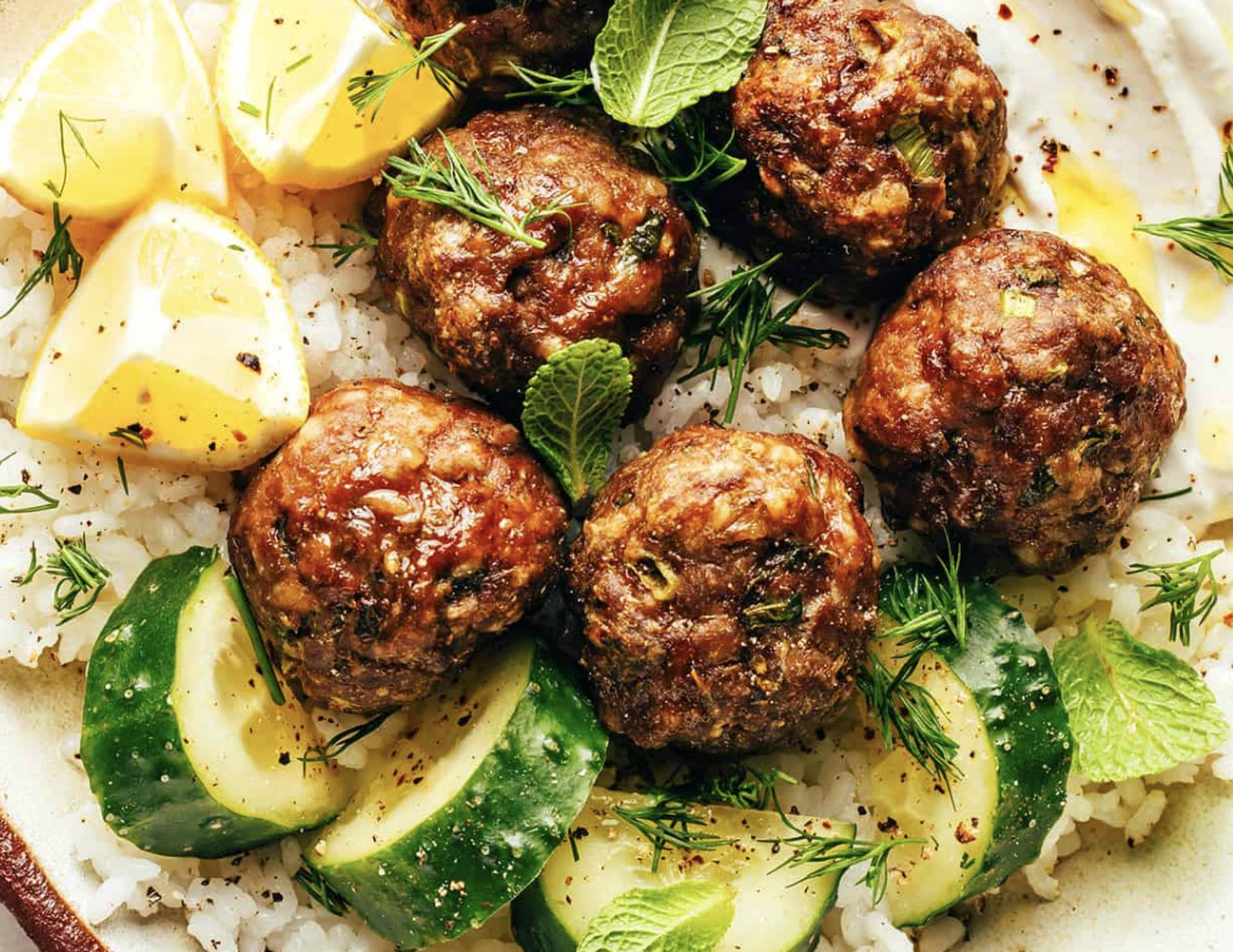 Grass Fed Greek Meatballs over Herby Lemony Rice with Zucchini, Farm fresh dill, mint, with Tzatziki (GF)