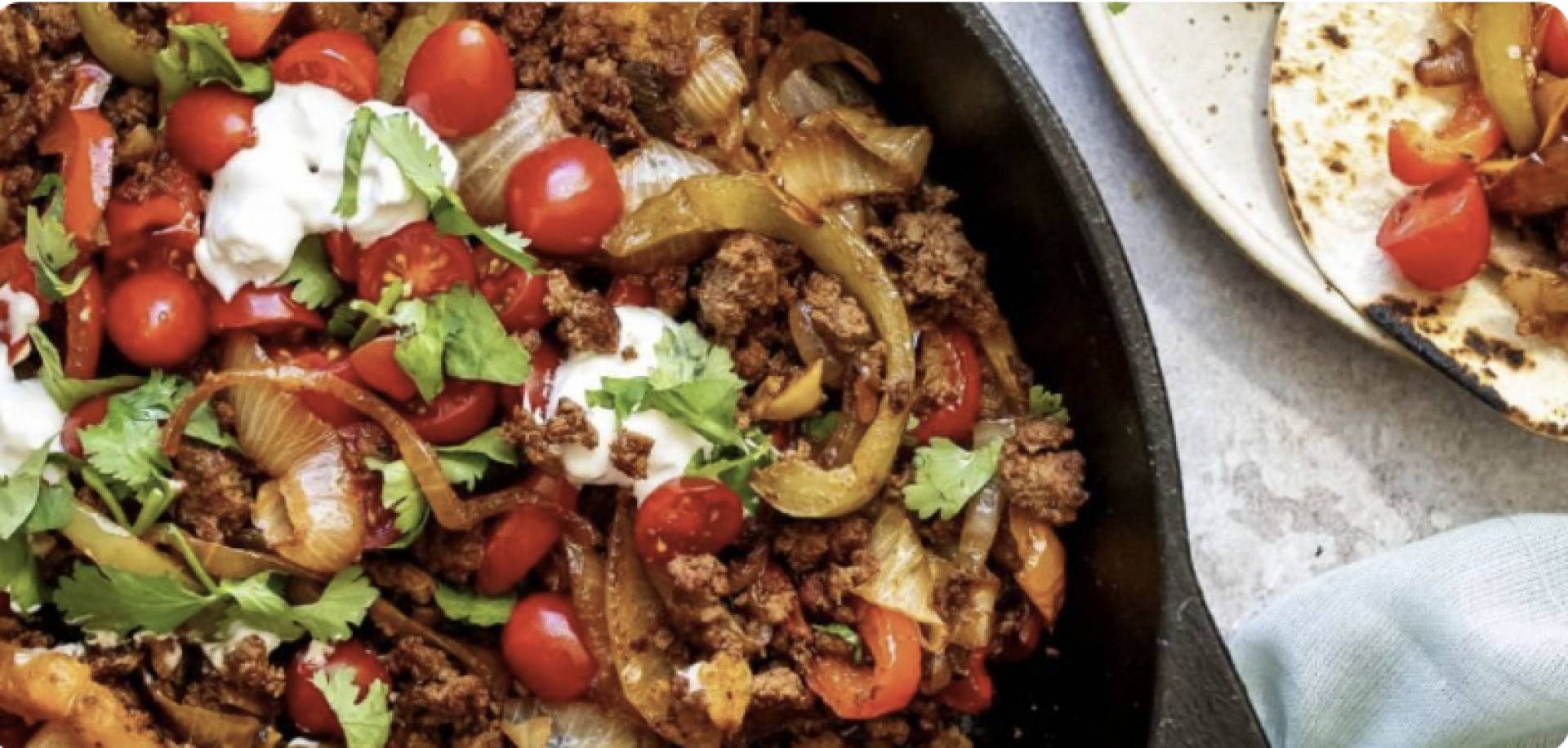 (GF/DF) Grass Fed Beef Fajita Bowl over Rice w Tomato, Onion, and Peppers. Cheese on Top (GF)