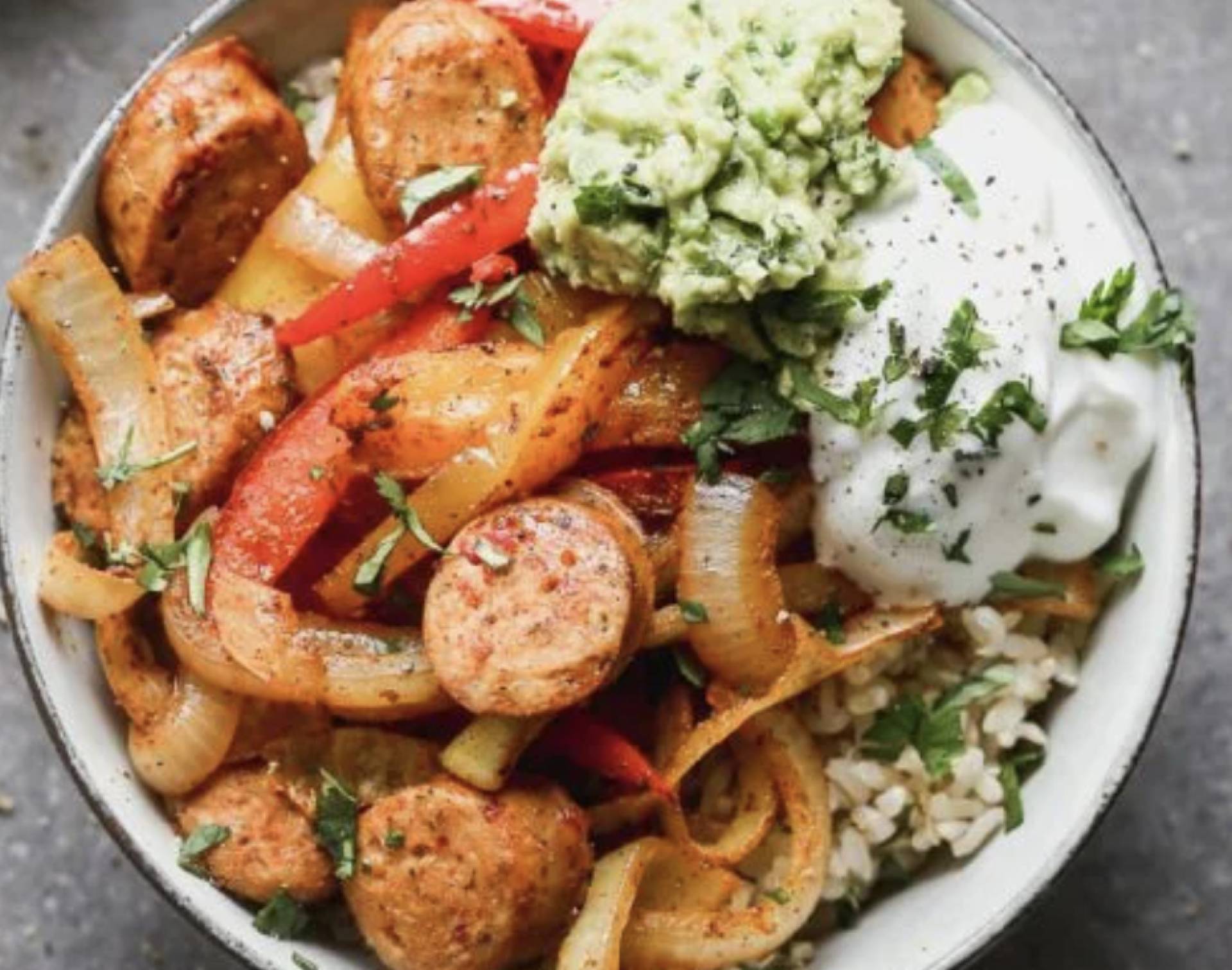 Local Boozy Pig Sausage Bowl with Grilled Peppers and Onions over Rice (GF/DF) Cilantro Vinaigrette